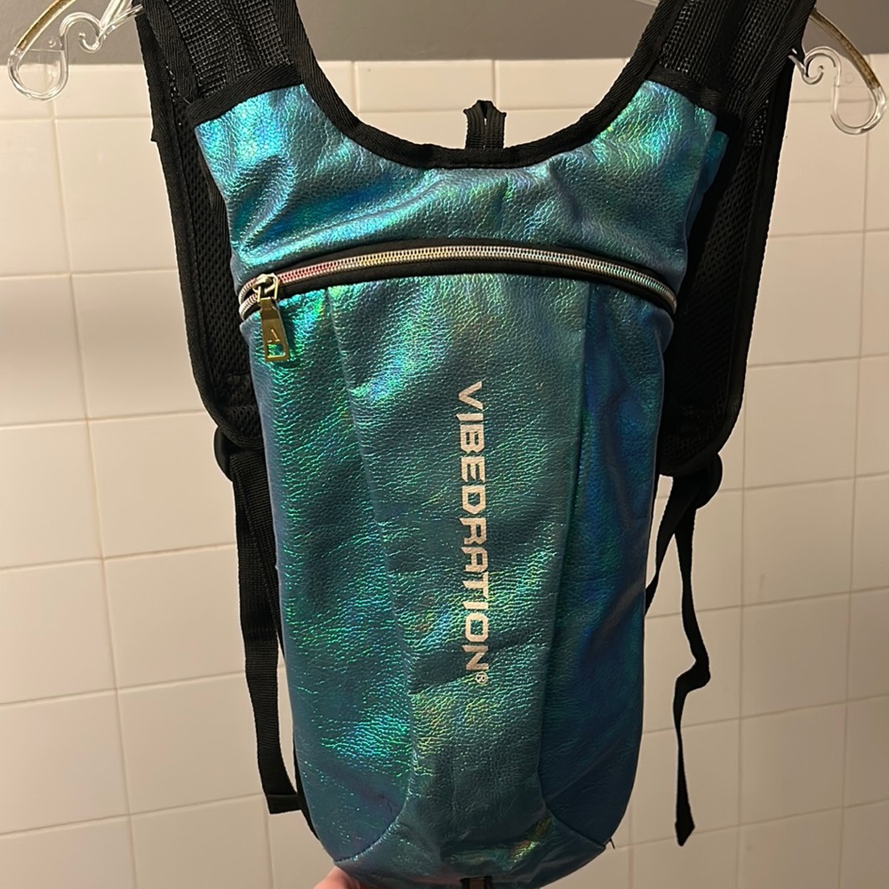 Metallic teal Vibedration Hydration Pack — water bladder not included